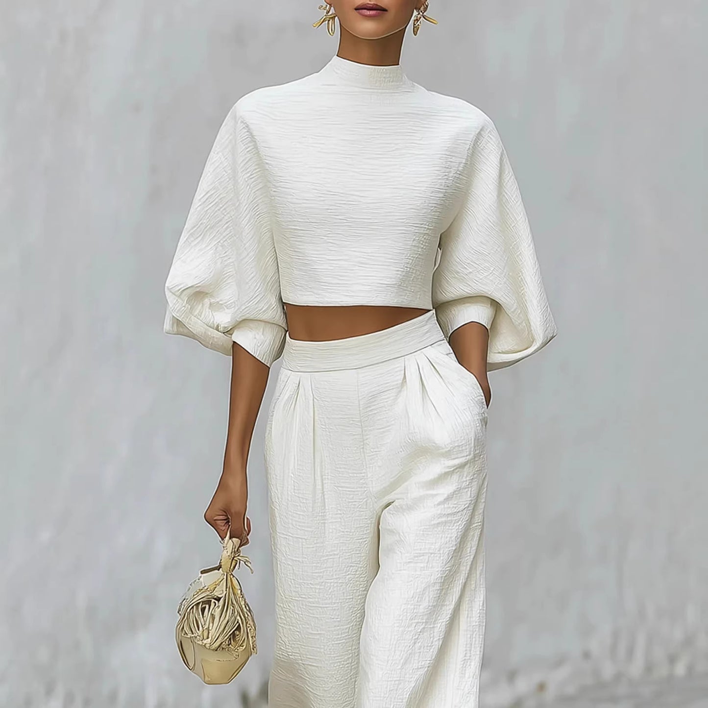 Kaksiosainen setti – lyhyt toppi & korkeavyötäröiset leveälahkeiset housut