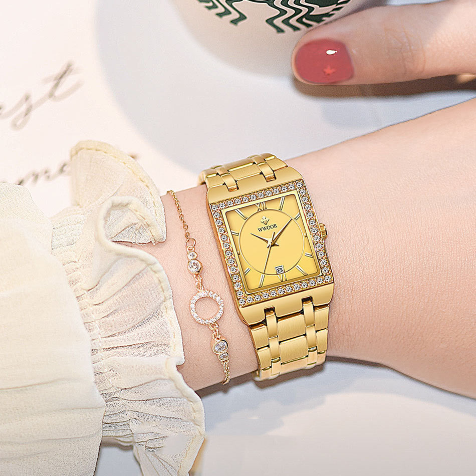 model wearing wwoor women's gold color wristwatch with sparkling details