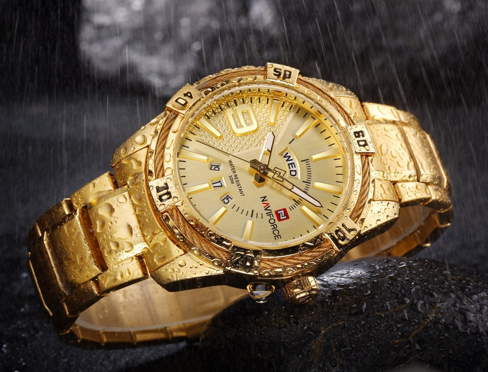 Close-up of gold NAVIFORCE men's watch showcasing bold design and durable materials.