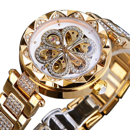 Women's gold color skeleton design automatic watch with diamond-cut details and white bezel