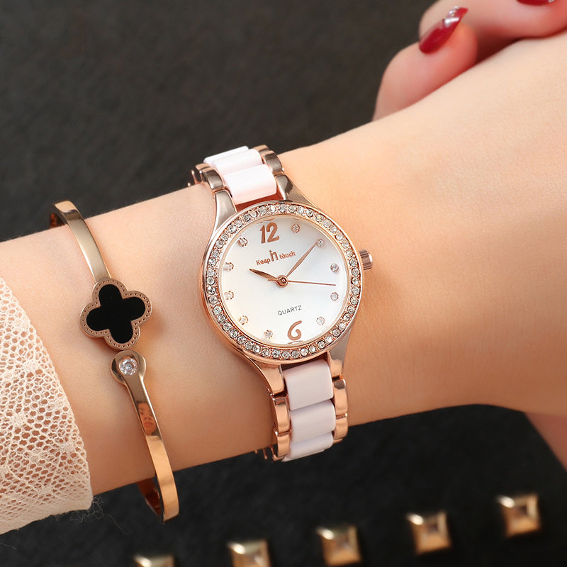 Women's elegant combination of rose gold and ceramic watch with zirkonias