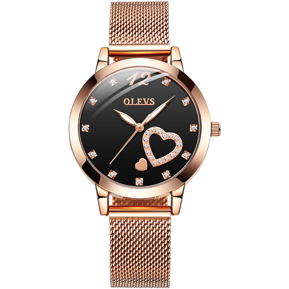 Olevs Rose Gold Heart Charm watch with black table and sparkling details close