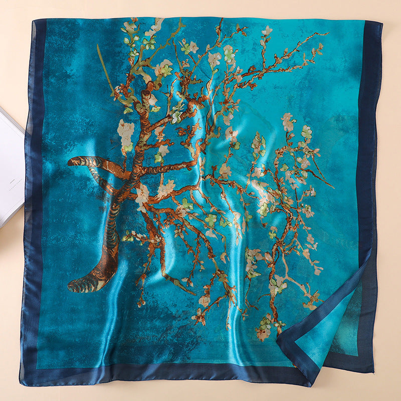 Women's blue silk scarf featuring beautiful patterns