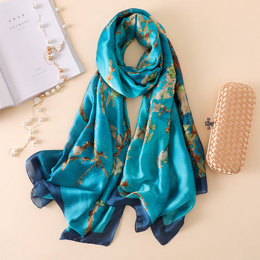 Blue silk scarf featuring beautiful patterns and high quality digital printing for versatile  use