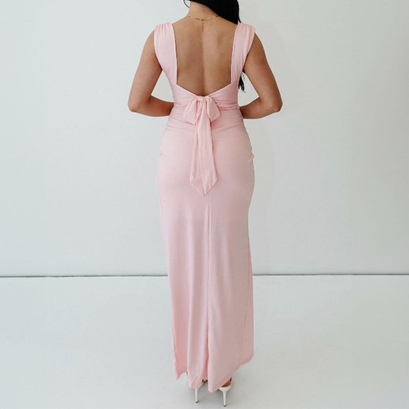 vaaleanpunainen pastelliväri kesämekko rusetti selässä
