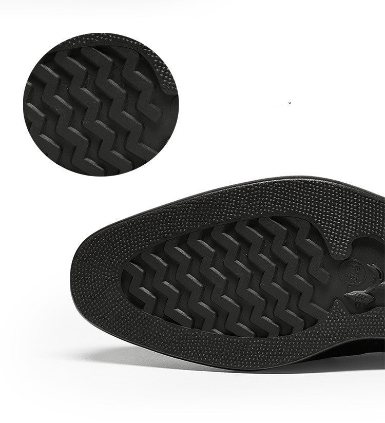 close-up photo of men's formal black shoe soles