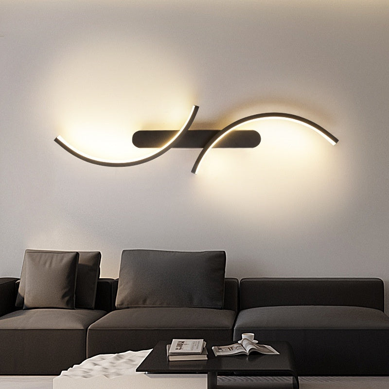 Modern LED wall light with curved design on living room wall