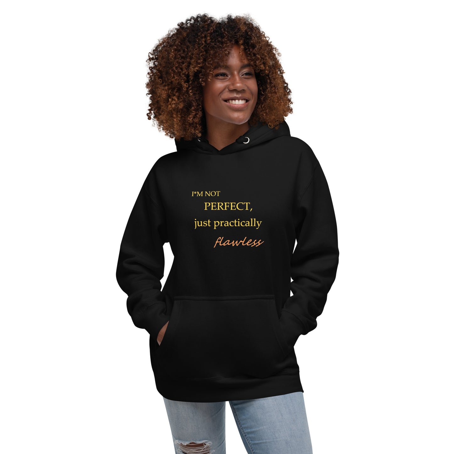 Model wearing a black unisex hoodie with "I'm not perfect, just practically flawless" design, hands in pocket, smiling.
