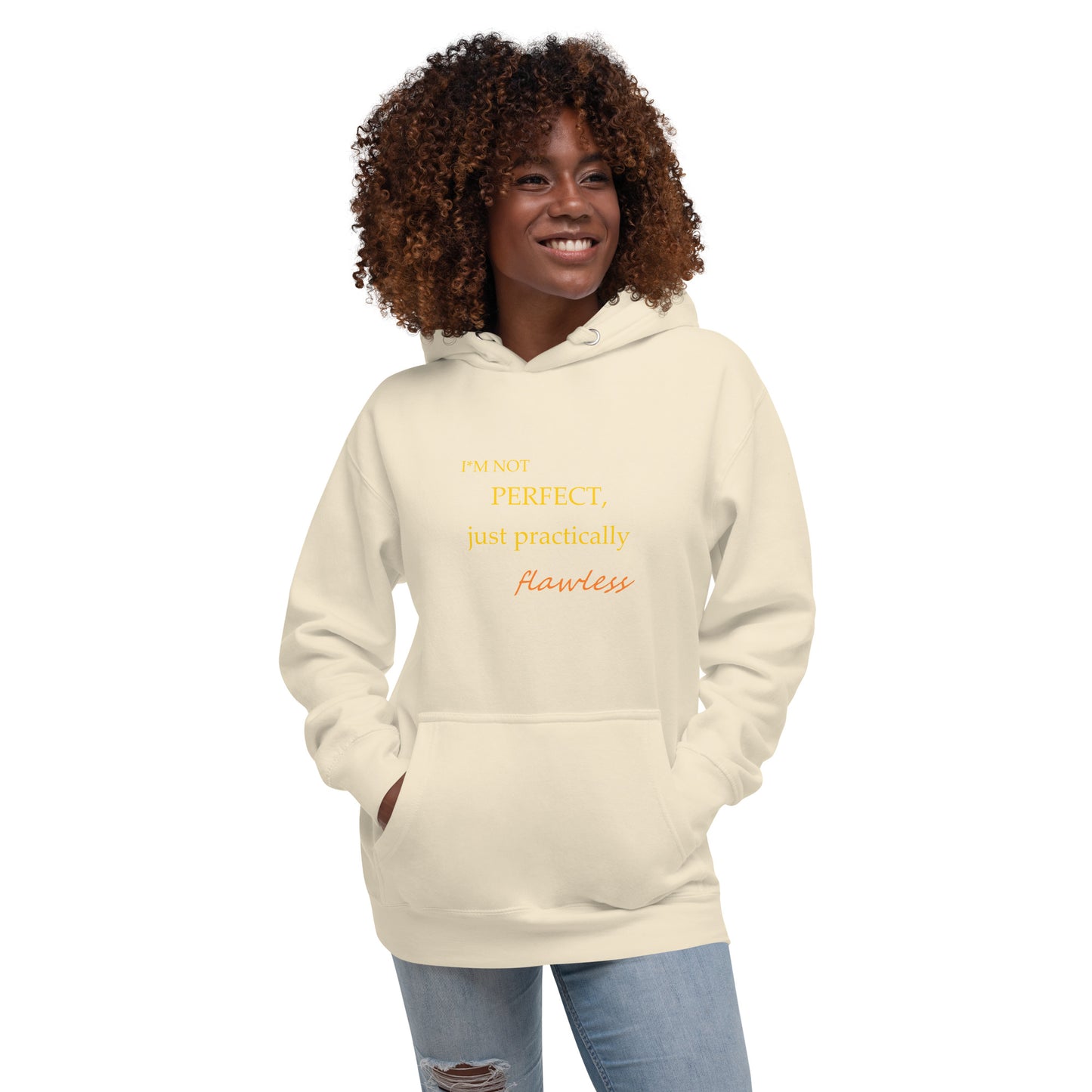 Model wearing a bone color unisex hoodie with "I'm not perfect, just practically flawless" design, hands in pocket, smiling.