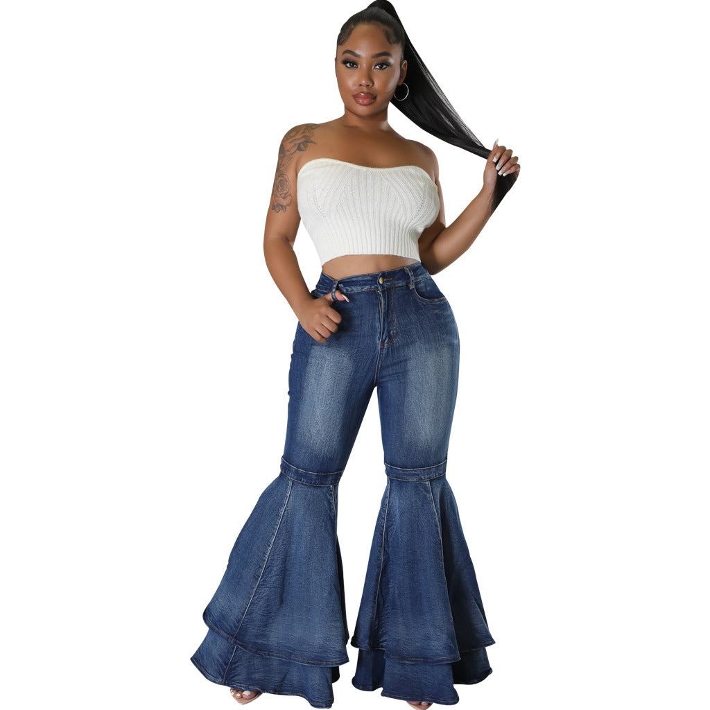 Wide leg high-waist blue denim flared jeans with bell-bottom style.