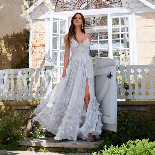 Flowy blue summer dress with high slit and lace-up back