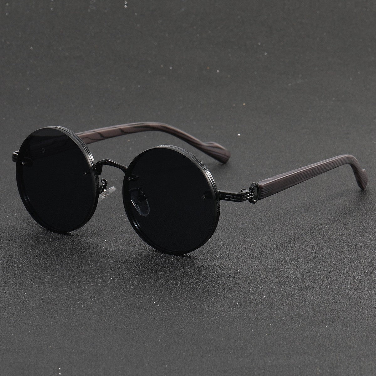 Retro round punk sunglasses with bold black frame and vintage vibe