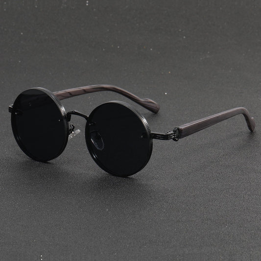 Retro round punk sunglasses with bold black frame and vintage vibe