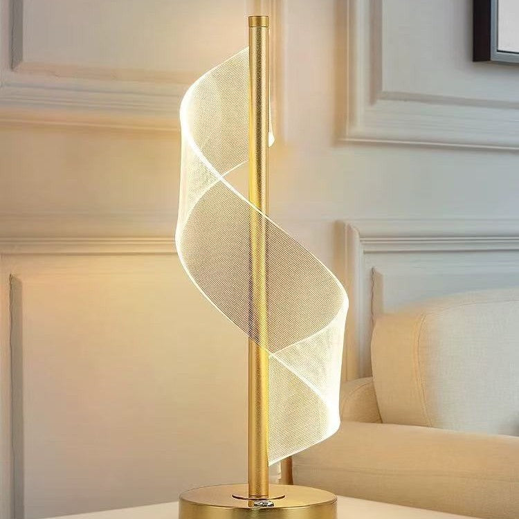 Golden LED table lamp adding a cozy ambiance to a modern room