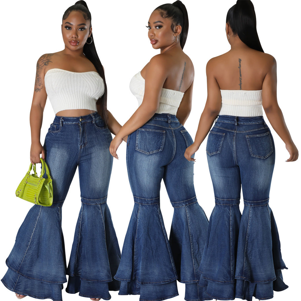 High-waist blue denim flared jeans, wide leg bell-bottom style.