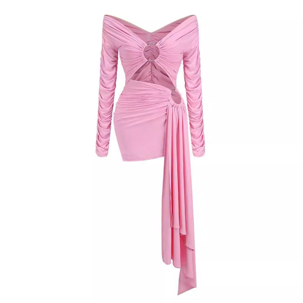 A bright pink off-shoulder asymmetrical dress with ruched details and front ring accent