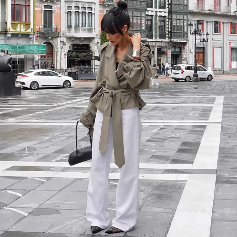 Olive belted trench coat – side profile