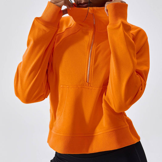 Orange cotton half-zip pullover – Women’s sporty long-sleeve sweatshirt in bright orange.