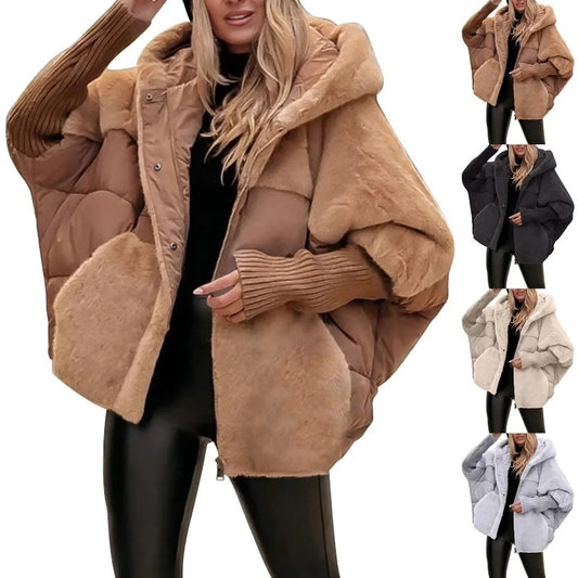 Woman wearing oversized brown faux fur patchwork hooded winter coat, multiple colors