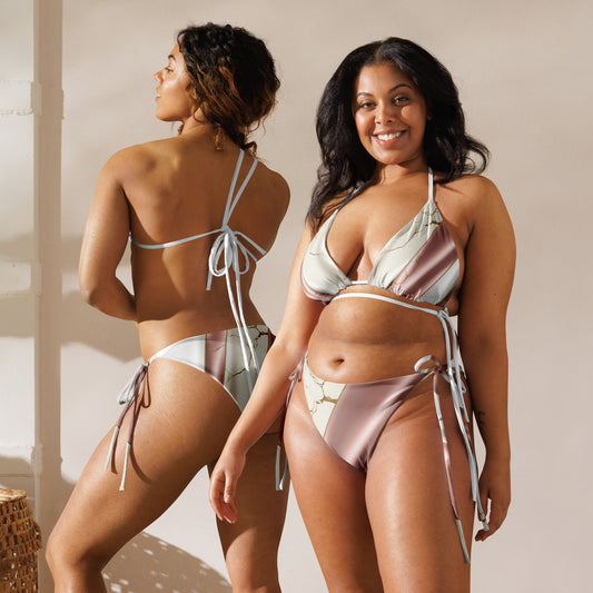 Two models showcasing Aylure Marble Luxe bikinis in different body sizes, highlighting inclusive sizing.