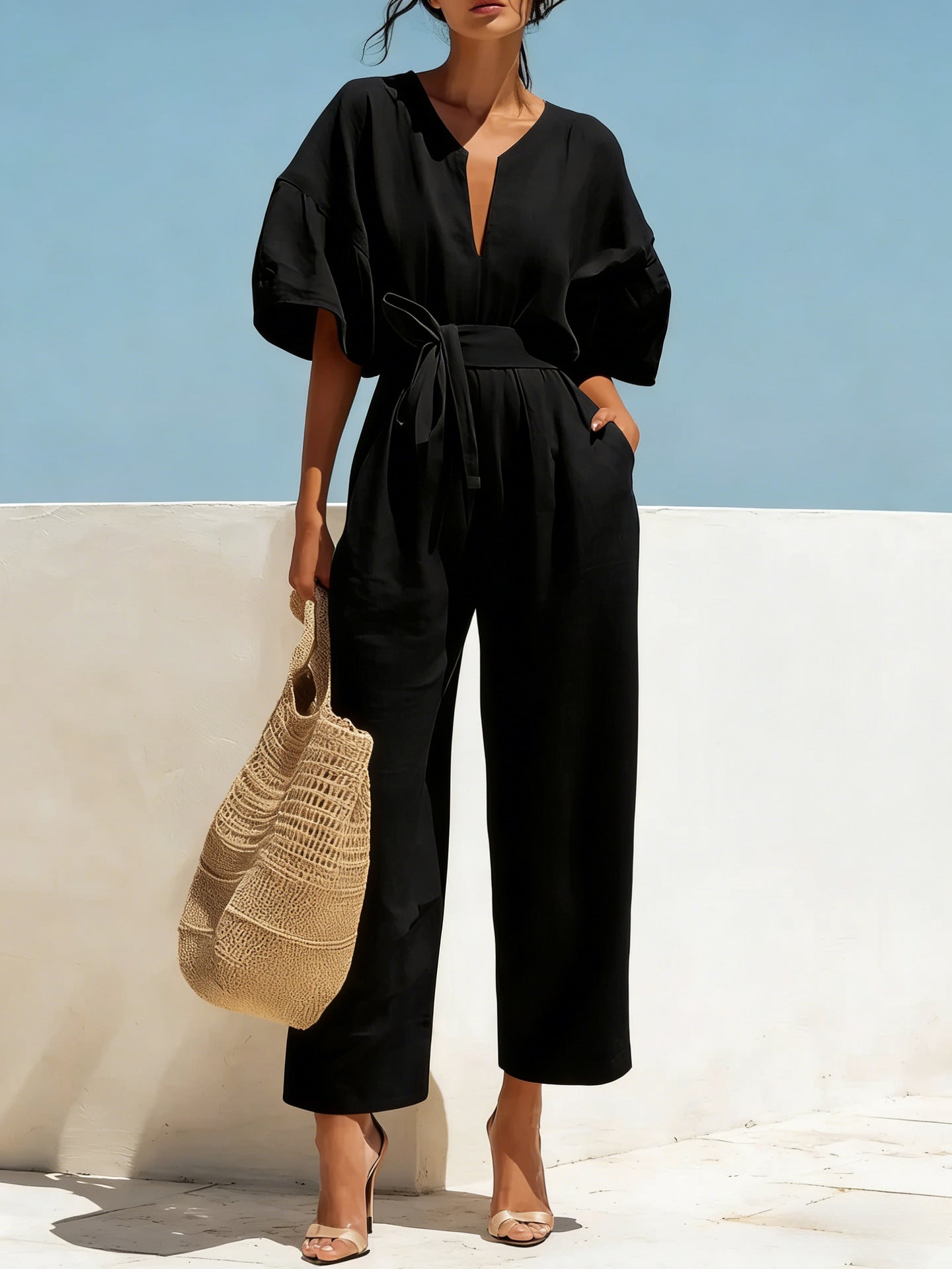 Black elegant V-neck jumpsuit with waist tie