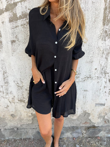 Black relaxed oversized button-up shirt and comfy shorts