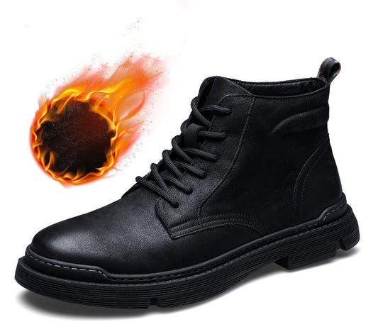 Black suede leather men’s boots on light background