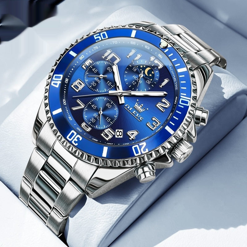 Blue and gold OLEVS watch with tachymeter bezel – stylish wristwatch on pillow