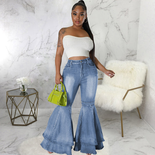 Wide leg high-waist light blue denim flared jeans with bell-bottom style.