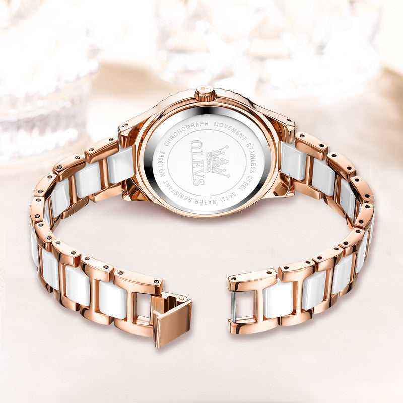 Rose gold and pearl white ceramic watch – classic back view on neutral backdrop