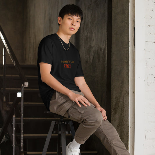male model wearing a black tee with bold marriage-themed statement