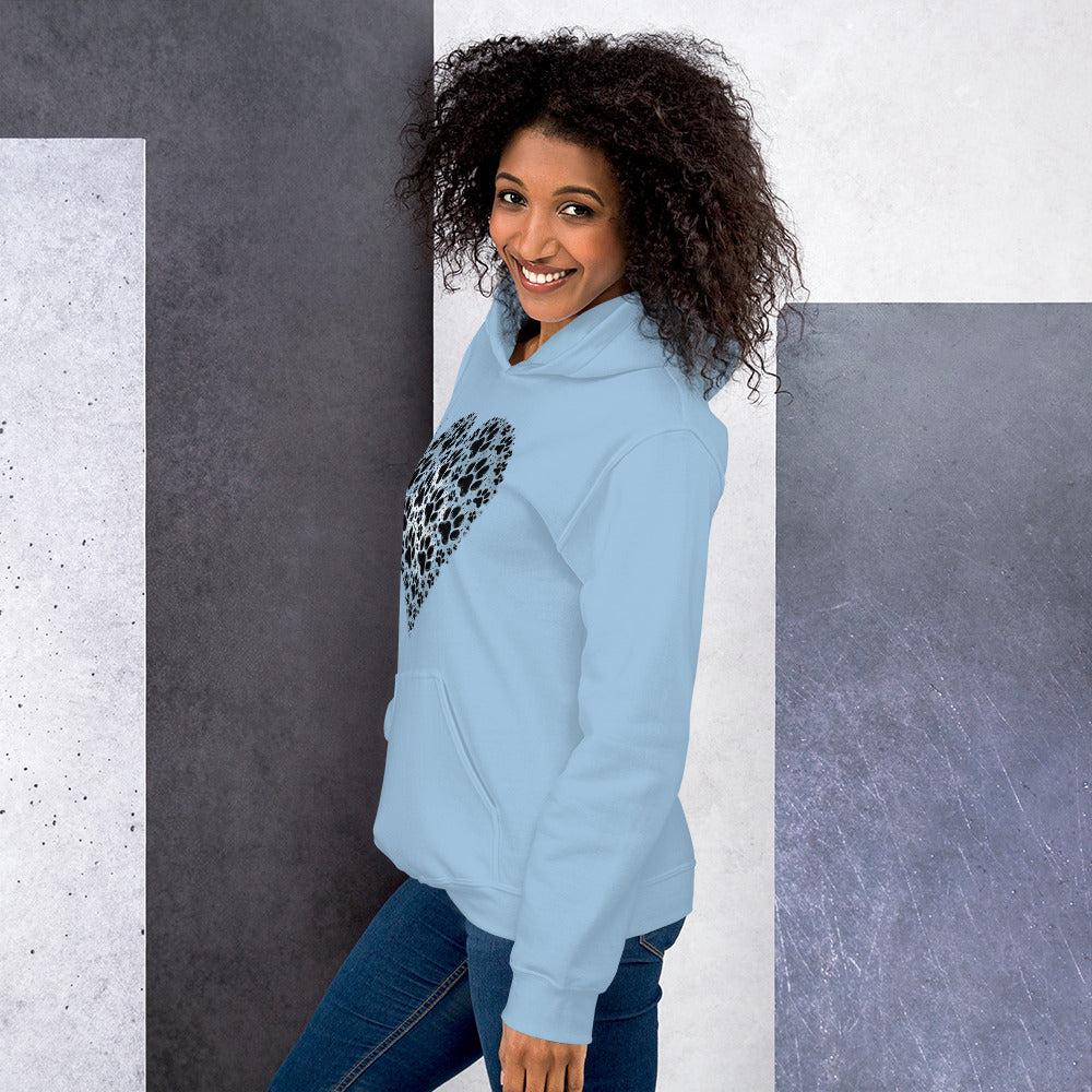 Smiling woman in profile view wearing the light blue Aylure Love Paw hoodie.
